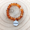 orange_carnelian_friend_177_wood_bg orange_carnelian_friend_177_wood_bg