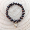 red_tigers-eye_northstar_charm_172_wood_bg